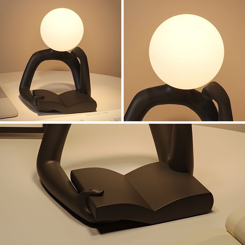 Modern Reading Man Artistic Table Lamp