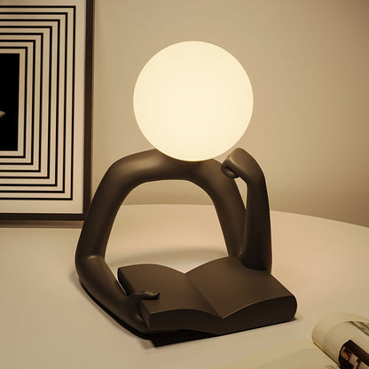 Modern Reading Man Artistic Table Lamp